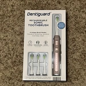 Sonic rechargeable toothbrush by dentiguard. Brand new in box